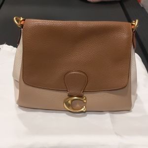 Beautifully loved elegant coach purse.  Great color and size.  Like new. Always